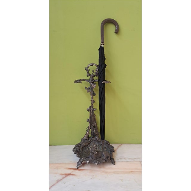 Fireplace tool holder, cane holder, or umbrella stand. Hunting motifs and plant and floral figures. It is heavy. Metal...