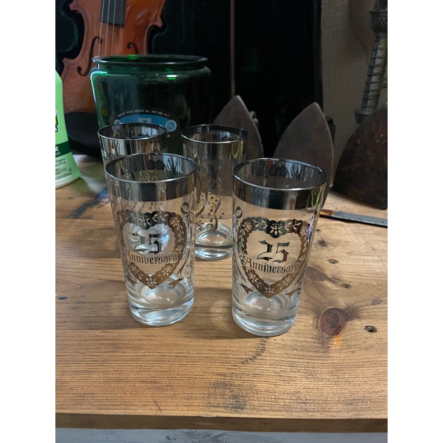 Up for consideration is a beautiful collection of silver and glass 25th anniversary cups. This would look lovely in your...