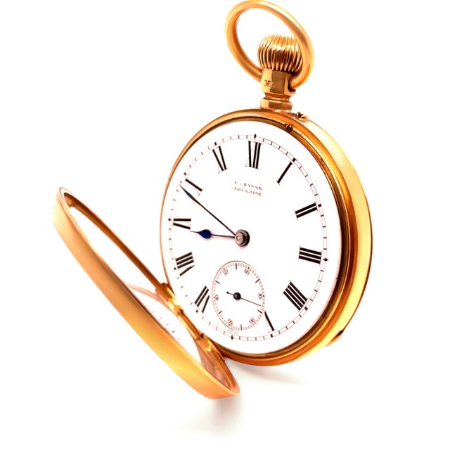 This rare 18ct yellow gold open dial pocket watch, made in London in 1881, is a remarkable antique timepiece crafted by...