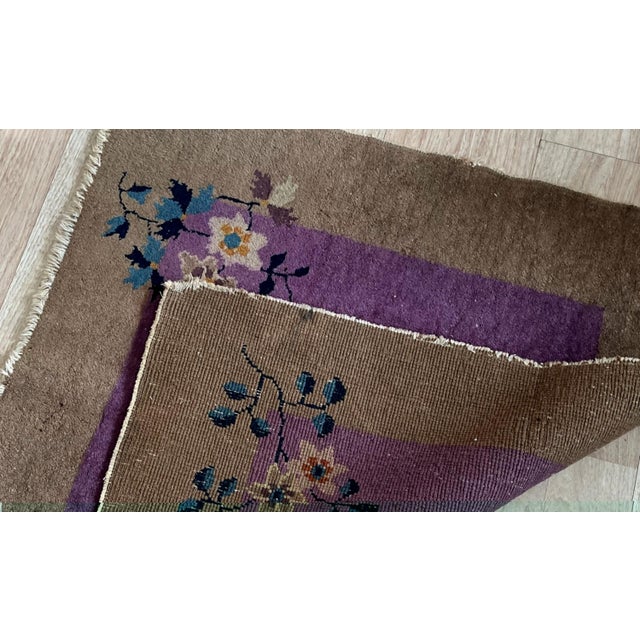 This stunning Vintage 1920s Chinese Art Deco Handwoven Wool Carpet with Floral Design showcases timeless elegance and...