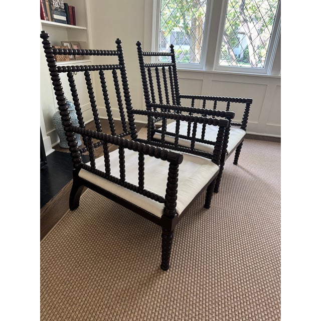 Pair of Noir Furniture Abacus Relax chair in distressed brown. Nailhead detail. Cushions are not included with the chairs....