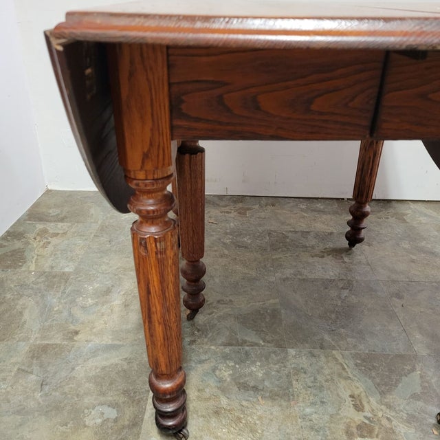 Antique English Chestnut Drop-Leaf Dining Table With Five Turned Legs and Castors, C. 1820–1840 For Sale - Image 9 of 11