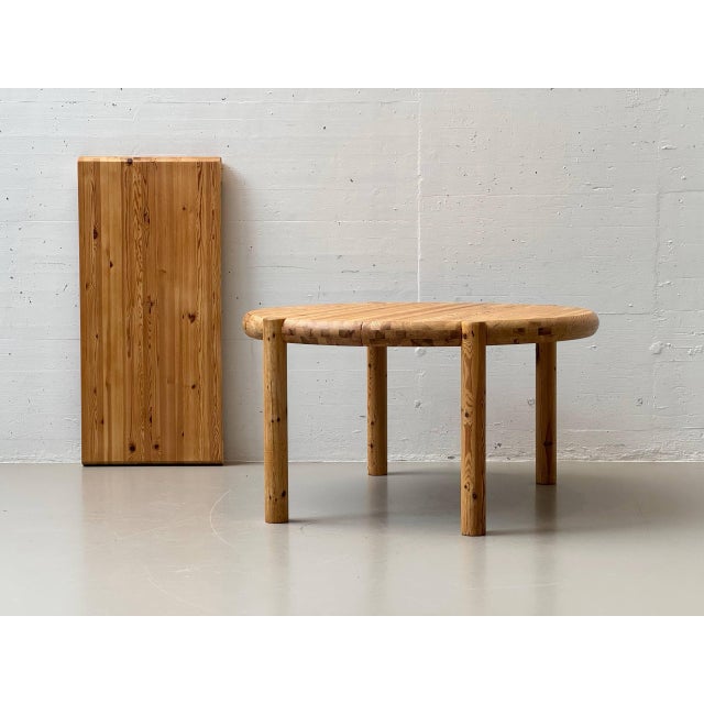 A robust, extendable dining table made of solid pine, designed by rainer daumiller in the 1970s. The table impresses with...
