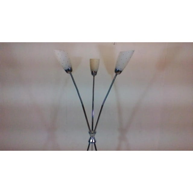 Presented at the exhibition Expo 58 in Brussels. The item made of chromed metal, and glass lampshades. Lamp has adjustable...