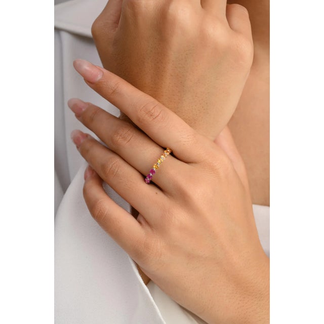This is part of Chairish’s Fine Jewelry assortment. Handmade Rainbow Multi Gemstone Eternity Band Ring in 14K Gold...