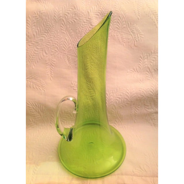This is a majestic hand blown Pitcher from the Art Glass Studio of the noted glass-maker Nicholas Kekic. Kekic did make a...