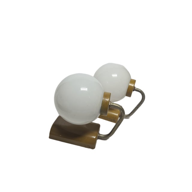A pair of sconces from the 30s. They are preserved in good condition. European Plug (up to 250V).The wiring of this item...