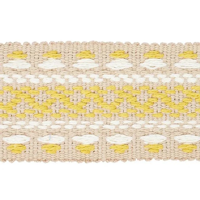 Jute yarns give this embroidered geometric tape an appealing dose of dimension for a textural finishing touch that will...