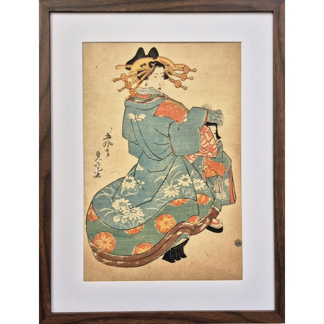 Set of 2 Edo era (ca 1850) Japanese woodblock prints of Bijin-ga / Geishas / Courtesans in kimonos. The first print is by...