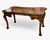 Dennis and Leen 21st C, American walnut writing desk. This exquisite, meticulously detailed, table in the Portuguese...