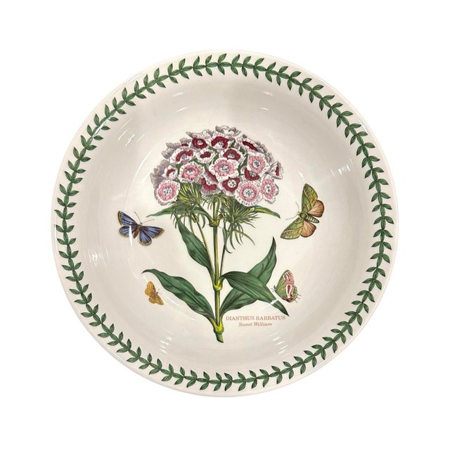 A gorgeous set of vintage low rim bowls by Portmeirion. Each features a central botanical image surrounded by stylized...