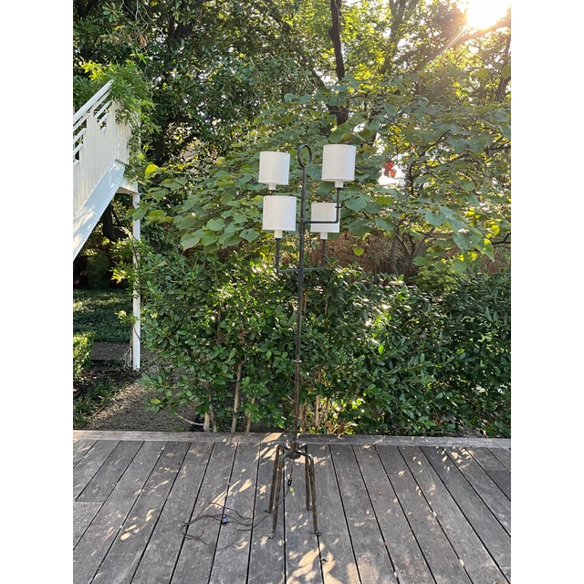 Elegant 1950’s Tommi Parzinger floor lamp designed and crafted in the 1950’s. It is made of wrought iron. The lamp has...