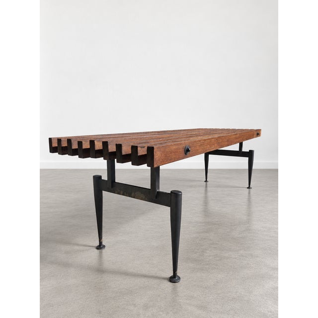 A refined and imposing slatted bench (which can also be used as a coffee table or end table) crafted from solid teak with...