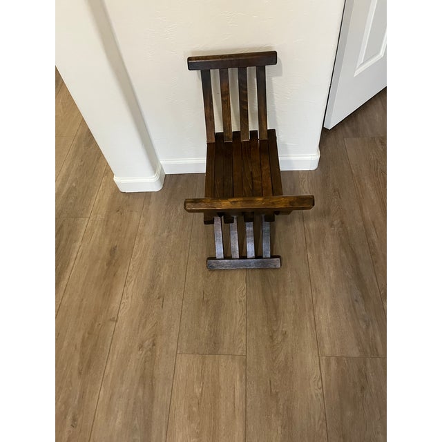 This product is a wooden folding chair, often referred to as a medieval style, Savonarola, or campaign chair. The chair is...