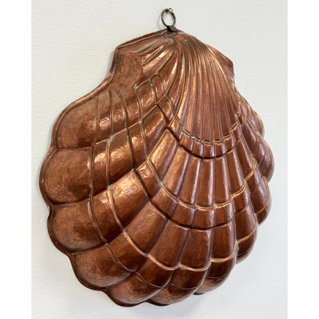 Vintage copper mold with tin lining. Lovely patina. Brass hook for hanging. Patina.