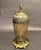 An extraordinary, museum-quality Islamic Revival table lamp, featuring an enameled glass body by the premier German glass...