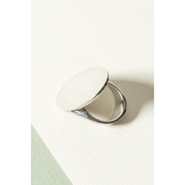 Sleek modernist silver ring Hans Hansen, with a large oval form with a slightly brushed surface. Weighty and nice on the...