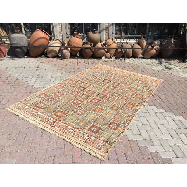 This beautiful, vintage, handwoven Kilim is approximately 60 years old. It is handmade of very fine quality, hand-spun...