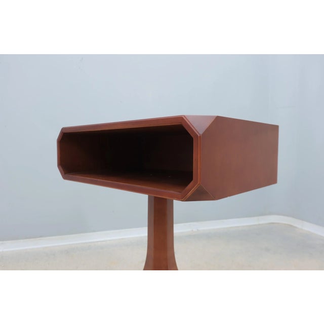 Nice lines for this sculptural luigi massoni design attributed revolving side table / console with storage produced during...