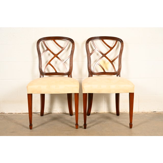 A gorgeous pair of Federal or Hepplewhite style side chairs or dining chairs By Kindel Furniture USA, Circa 1980s Carved...