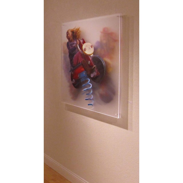 Red Rover, Red Rover captures the exhilarating moment of a child on a toy motorcycle, embodying a sense of joy and...