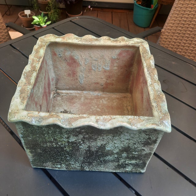Raku flower pot with amazing colors of greens leading to soft tones of burnt Sienna and Ochre and intriguing texture and...
