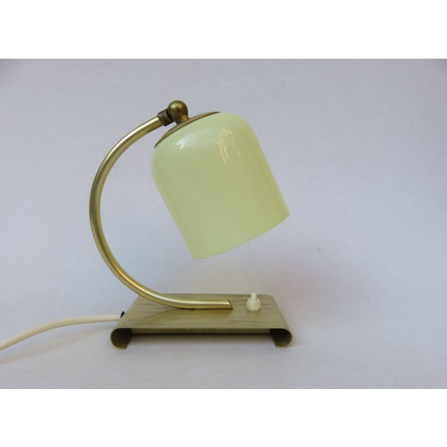 An elegant Art Deco bedside lamp in the period's characteristically minimalist design. Based on its manufacturing...