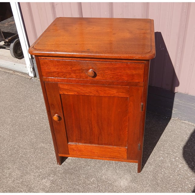 Antique Walnut One Door Wash Stand Commode with Drawer 1870s An 1870s antique solid walnut one door wash stand commode...