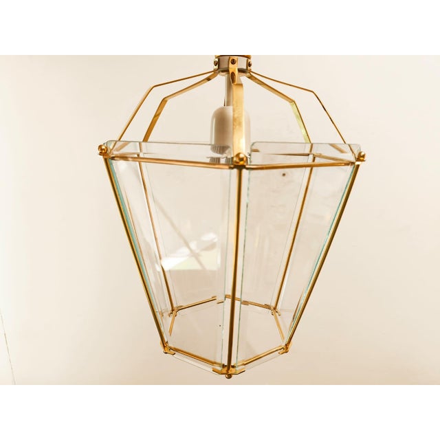 Brass and Clear Glass Lantern, in Very Good conditions. Designed 1920 to 1949 Up to 250V (Europe/UK Standard).The wiring...