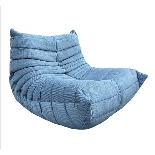 Togo Lounge Chair in Light Blue Corduroy by Michel Ducaroy for Ligne Roset, in Restored conditions. Designed 1970 to 1979...