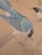 Beautiful large-scale Chinoiserie-style painted panel featuring delicate birds perched among bamboo, florals, and a serene...