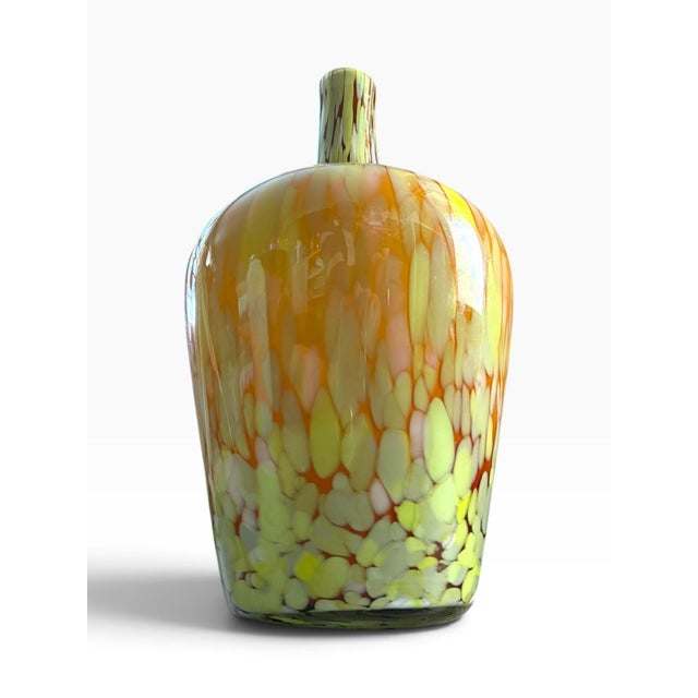 Striking vintage Murano-style art glass vase featuring a warm amber-yellow glass body densely decorated with layers of...