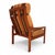 A striking Danish lounge chair from the 1960s, where warm teak wood and an exceptional, original wool fabric combine to...