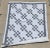 Black and white postage stamp Quilt. Wonderful muted blacks give a darker gray look to the postage stamp portion of the...