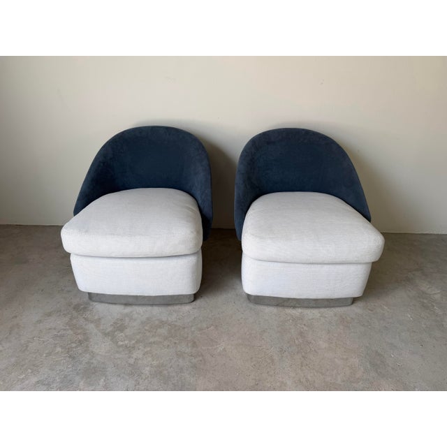 Designed by celebrated Italian designer Rodolfo Dordoni for Minotti, this exceptional pair of Lawson Lounge Armchairs...