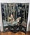 This beautiful Chinese screen is made up of four lacquered panels decorated with birds and bamboo. It is a Chinese work....