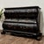 Striking black Chinoiserie style bombe chest featuring a richly textured lacquer-style finish and hand-painted Asian-...