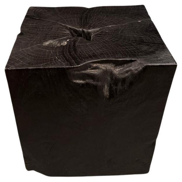 Sculptural teak wood side table hand carved whilst respecting the natural organic wood. Charred, sanded and sealed...