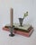 A pair of antique pewter tulip candle holders by one of Denmark's most highly acclaimed metalware designers Just Andersen....