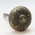 This six fold knob was made in 1920. The manufacturer is unknown. It is part the J-31300 group. The dimensions are 2.25...