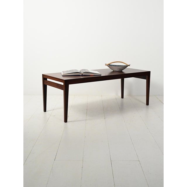 Elegant 1960s Danish rosewood coffee table, designed by Severin Hansen for Haslev, featuring pure lines and impeccable...