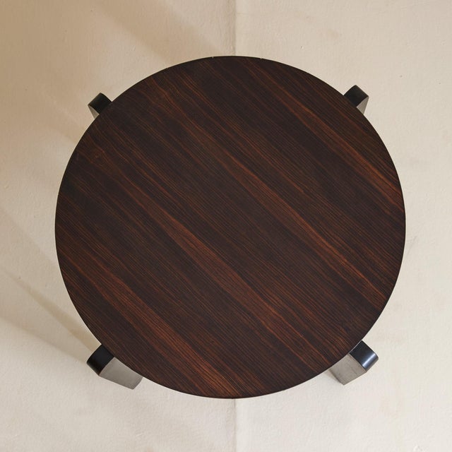 Solid and purposeful, this 1940s French Art Deco coffee table, sourced from Paris, has a grounded, architectural feel. Its...