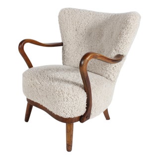 Danish Art Deco Lounge Chair in Beech and Sheepskin in the style of Viggo Boesen for Fritz Hansen, 1940s For Sale
