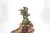 Vintage Hummel style brass figurine of a boy carrying a sack on a stick over his shoulder. Good condition with a couple...
