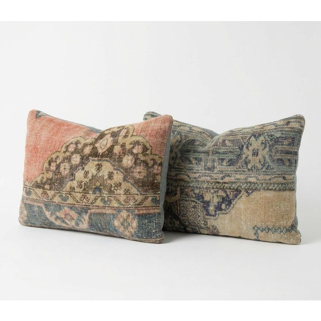 This beautiful 16'' x 24'' pillow cover set was made from authentic Turkish rug pieces. Bright colors of wool adorn the...