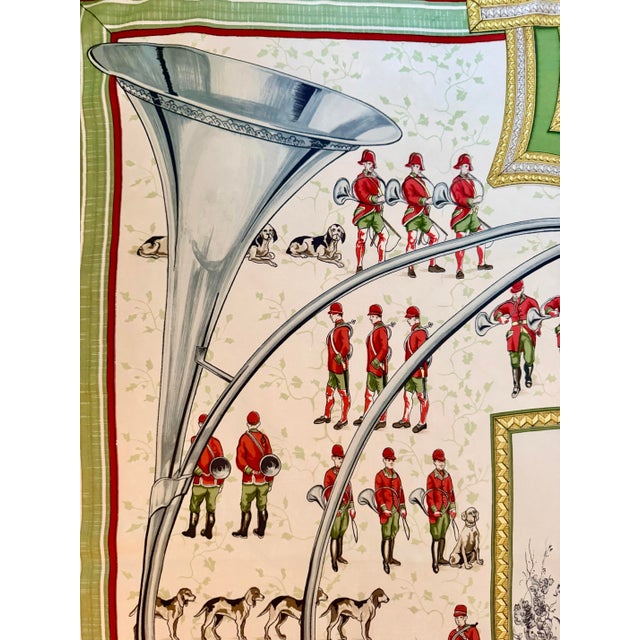 Hermès "Sonneurs de Trompe" This scarf, featuring a classic Hermès theme, depicts a highly stylized scene of a traditional...