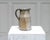 A lovely ceramic pitcher by Dominique Pouchain, dating from the 1960s. Its simple yet generous shape is enhanced by a...