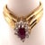 14 Karat Yellow And White Gold Ruby Ring With Diamond Accents 0.50 TDW. Size 7 4.43 grams total weight.
