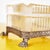 This elegant ashtray is a charming example of vintage design, crafted from clear glass with a refined, decorated metal...