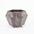 Bronze French polygon-shaped jardinière, circa 1925-1935. Two shaped handles mirror the raised diamond-shape decoration...